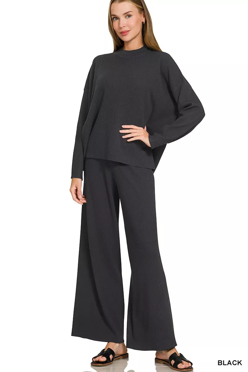 Black long-sleeve sweater top with matching wide-leg pants
